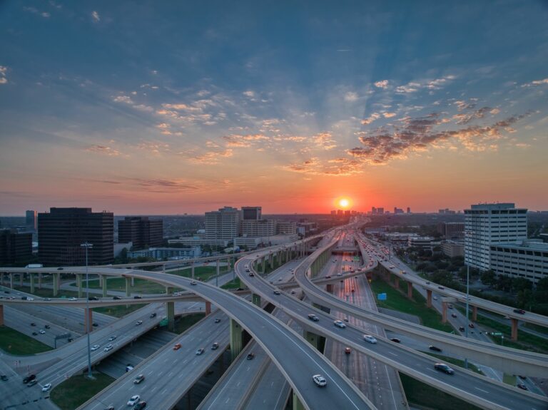 Drone shot over the High Five Interchange in Dallas, Texas, USA at sunset
