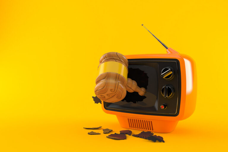 Gavel inside tv isolated on orange background. 3d illustration